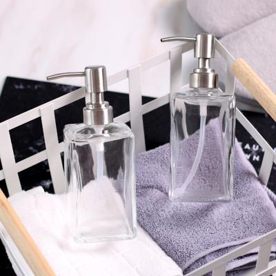 China Household Products Square hand sanitizer with pump head clear household glass bottle for sale