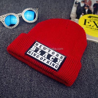 China Winter Hat Women / Men COMMON Beanie Knitted Warm Cool Caps With Rubber Label for sale