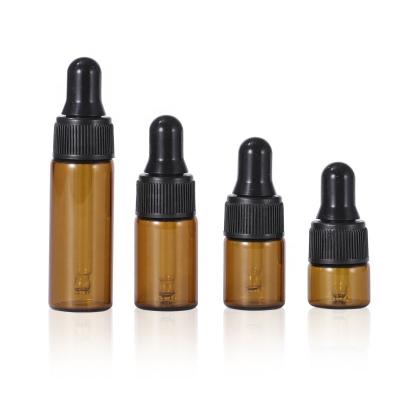 China Personal Care Empty Essential Oil Bottle 1ml 2ml 3ml 5ml Luxury Amber Glass Dropper Bottles For Skin Care Essential Oil for sale