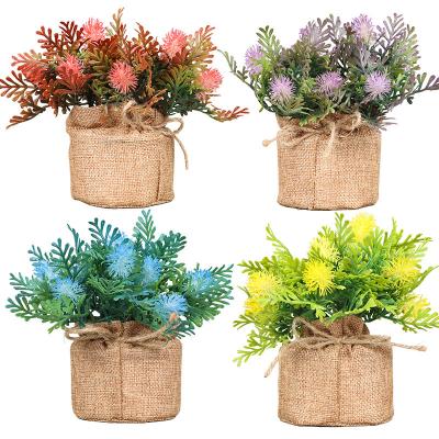 China Plastic Artificial Flower with Bag and Cotton Rope Plastic Fake Flower for Decoration Wedding Garden Terrace Home Decoration for sale