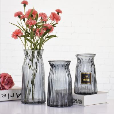 China European simple creative transparent color glass flower vase hydroponics device flower style origami vase large beautiful home furnishings for sale