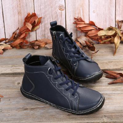 China Durable Comfortable Warm Fur Lined Waterproof Side Zipper Ankle Boots Flat Boots For Autumn And Winter for sale