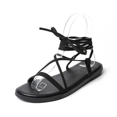 China Fashion Trend Summer Hollow Around Roman Sandals Women Open Main Gladiator Open Toe Flat Sandal Cross Straps Sandals Flat Shoes for sale