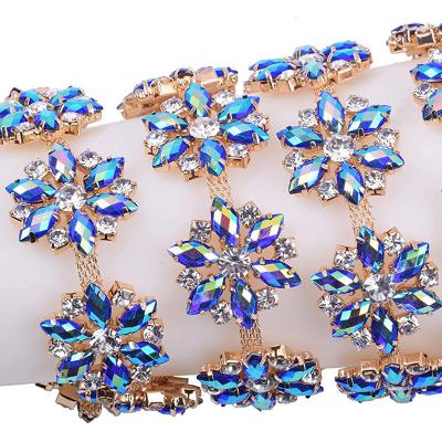 China Flatback Flower Pattern Rhinestone Chain Trim, Inlaid with AB Blue Crystal Rhinestone and Gold Brass Low Prong Chain for Sewing Craft for sale