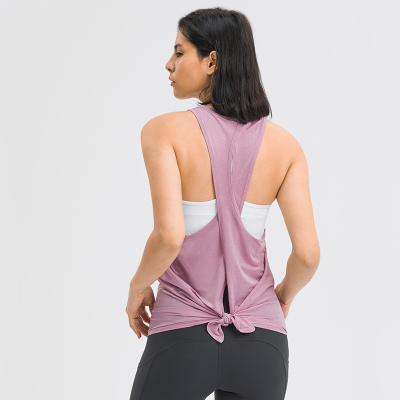 China New Breathable Sexy Women Beach Shoulder Strap Top Cross Shirt Permeable Loose Breathable Exercise Yoga Vests Women for sale