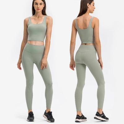 China Breathable Yoga Two Piece Sets Women Fitness Gym Women High Waist Lift Hip Yoga Pant Leggings With Sports Bras High Print Gym Equipments for sale