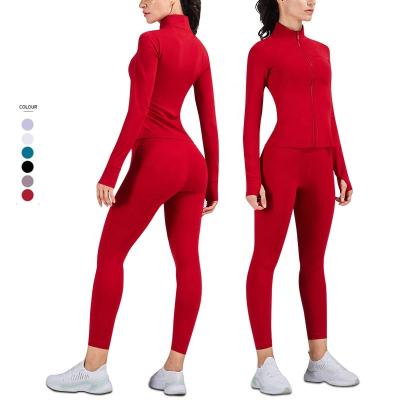 China Autumn Women Yoga Set Workout Breathable Coats Pocket Fitness Pants Long Sleeve Slim Sports Jacket Gym Teams Yoga Gaiters Set for sale