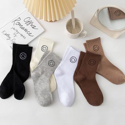 China Polyester Wholesale high quality embroidered smiley face lace ladies socks winter warm women socks for sale