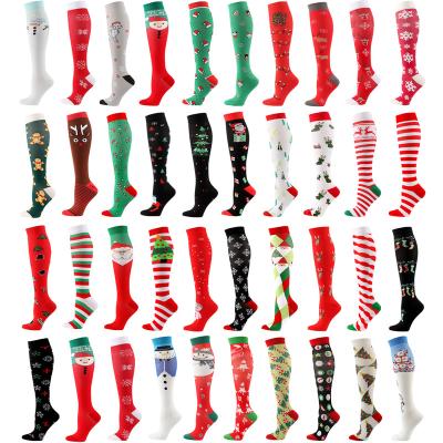 China Sporty Wholesale New Popular Xmas Santa Christmas Pressure Socks Unisex Adult Compression Socks for gift for sale