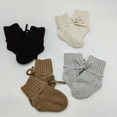 China QUICK DRY Factory Customized Cute Warm Baby Socks Knit Short Booties Newborn Shoes 100%merino Wool Material Infant Stockings Drawstring for sale