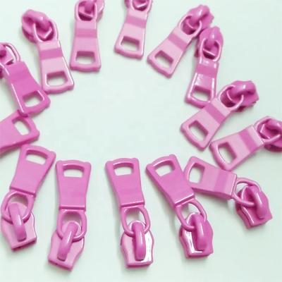 China Durable Nylon Slider Customized 5# Logo Nylon Puller Zipper Pulls For Handbag for sale