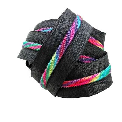 China Durable Zipper Tape Pink with Rainbow Coil Teeth - #5 Zipper by Yard Meterr for sale