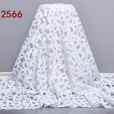 China Viable Wholesale 2566 Sequins Lace Fabric Flower Tulle Net Lace Fabrics FO African Sheer White Embroidered Dresses for sale