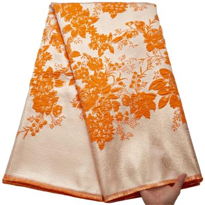 China 2698 Viable New Color Embroidery Jacquard Orange Brcade Soft Fabric African Gilding Laces Fabrics For Women for sale