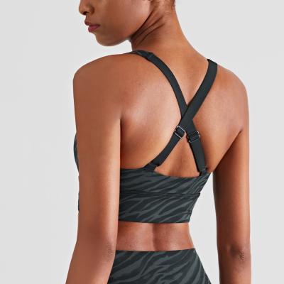 China 2022 Adjustable Straps Back X Shaped Fitness Breathable Tank Workout Tops Women Yoga Sports Anti Vibration Gathered Bra for sale