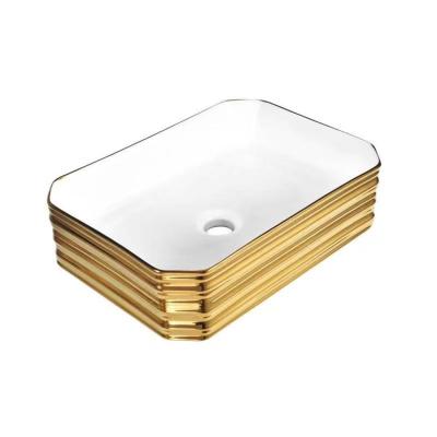 China Modern Luxury Modern Color Ceramic Plating Bathroom Sinks Gold Hand Wash Sink for sale