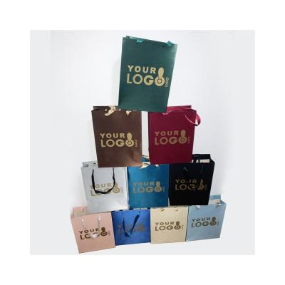 China Personalized Design Colorful Ribbon Logo Recyclable Custom Luxury Gift Paper Shopping Bag for sale