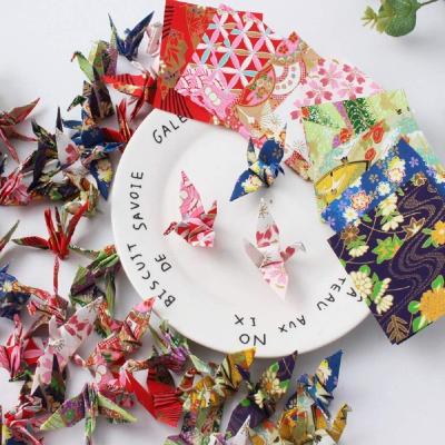 China Washi Paper 100PCS Mini Premade Origami Washi Paper Cranes Folded Origami Cranes Handmade Yuzen Paper Cranes Gift for Wedding Party Favors for sale