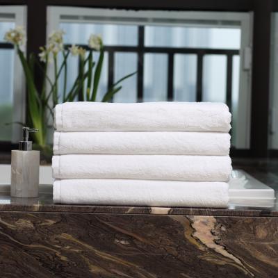 China Quick Dry Soft Hotel Bath Towel Solid Color Cotton Hotel Good Quality for sale