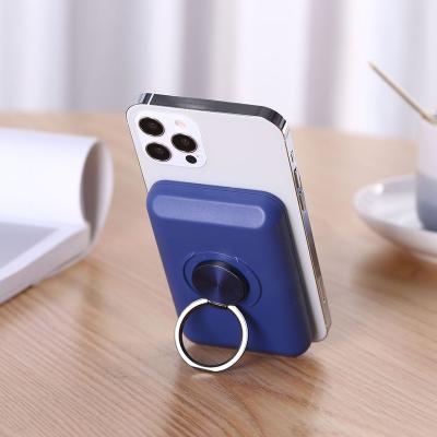 China iPhone Series New Design Wireless Magnetic Energy Powerbank for iphone 13 pro mini max with ring holder 5000mah power bank for iphone 12 11 for sale