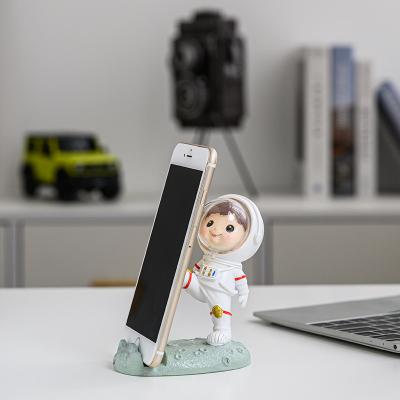 China Creative Cute Toys Style Mobile Phone Holder Waterproof Desktop Astronaut Phone Holder Tablet Stands Defender For iPhone for sale