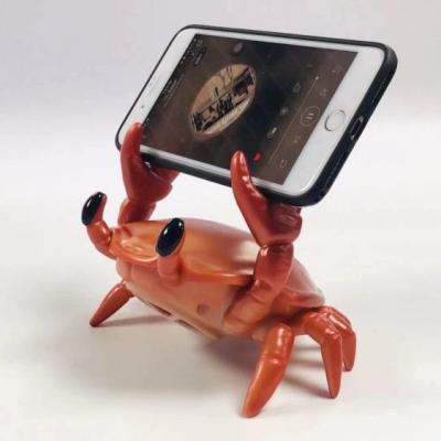 China Adjustable Cute Crabs Play With Phone Speaker Stand Function Loudspeaker Mobile Phone Desk Stand Wireless Sound Holder for sale