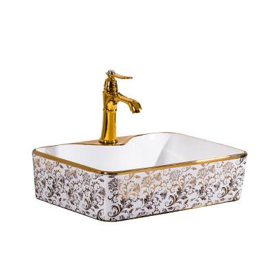 China Contemporary Ceramic Gold Oval Basin Lavatory Art Sink Flower Oval For Use In Hotel Home Bathroom Basin Sink for sale