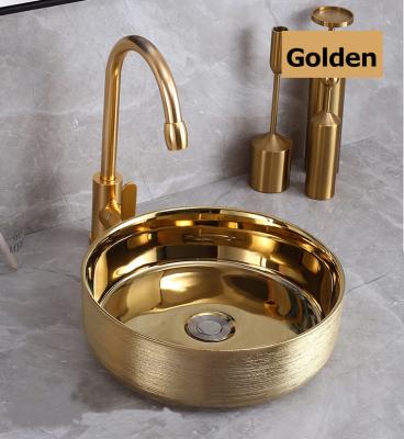 China Contemporary Gold Plated Ceramic Features Creative Swept Gold Plated Ceramic Features Wash Sink Scratch Countertop European Style Countertop for sale