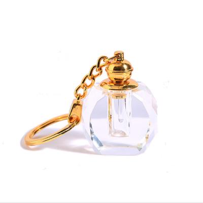 China New 1ml crystal keychain oil bottle Arabian essential bottle glass portable stick perfume bottle for sale