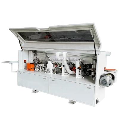 China Hotels PVC Edge Edging Machine Semi Automatic Wood Edge Edging Machine With Trimmer Edge Edging Machines for sale