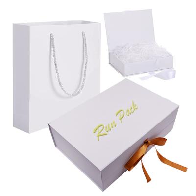 China Luxury Recyclable Custom Cardboard Foldable Wedding Dress Storage Boxes With Magnetic White Folding Gift Shoe Box For Clothes Packaging for sale