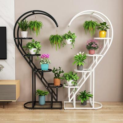 China Nordic Creative Heart Shape Metal Flower Rack Plant Ladder Wrought Iron Floor Plant Stand Metal Indoor Display Stands for sale