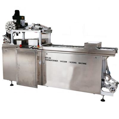 China Food Small and Economical biscuit Automatic continuous thermoformed stretch film vacuum packaging machine for sale