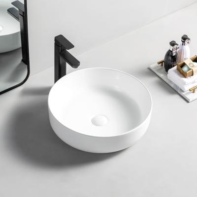 China Durable China Manufacturer Bulat Wastafel Keramik Round Hand Wash Basins Luxury Ceramic Countertop Basin Bathroom Sink for sale