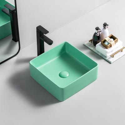 China Wastafel Cuci Tangan Modern Design Bathroom Sink Undercounter Ceramic Sink Under Mounted Sink for sale