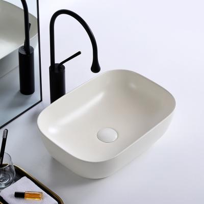 China 18 Inch Rectangular Cabinet Top Mounted Color Art Washbasin Ceramic Cheap Bathroom Sink Bowl for sale