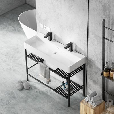 China OEM ODM Easy Clean Customized Ceramic Bathroom Sink With Towel Backer And Wash Hand Basin for sale