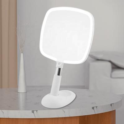 China Square LED Lighted Makeup Handheld Mirror With Stand 3 Color Dimmable Lighting Vanity Mirror Cosmetic Mirror With Handle for sale