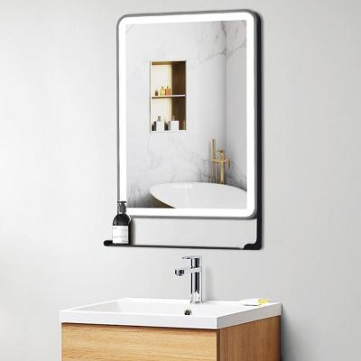 China LED Lighted Bathroom Vanity Mirror Wall Mounted Mirror With Clock Touch Switch With Fogproof And Waterproof Metal Framed for sale