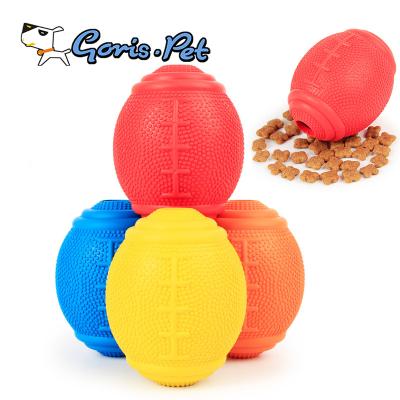 China Durable High Quality Rugby Shaped Rubber Dog Treat Toy Ball for sale