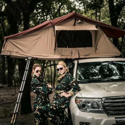 China 2020 Popular High Quality Universal Folding Camouflage/Field Game Poland Roof Top Tent Car Camper Roof Tent Box Waterproof Car Top Tents for sale