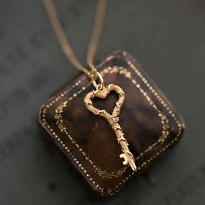 China Trendy S925 Silver Retro European and American Creative Design Heart shaped Key Pendant Sweater Necklace Women's Jewelry Wholesale for sale