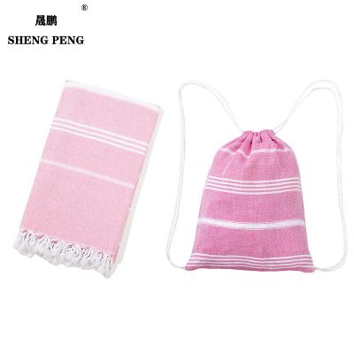 China Custom Made Oversized 100% Cotton Turkish Bath Pestemal Towel Wholesale Hypoallergenic 100% Turkish Beach Towels With Bag for sale