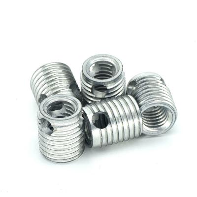 China Type 308 3 Hole Thread Repair Industry General Carbon Steel Self Tapping Insert for sale