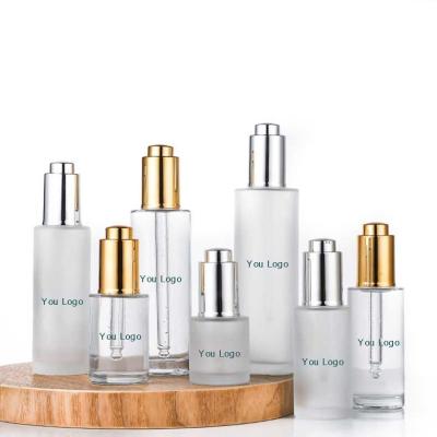 China Cosmetic in stock clear frosted glass bottle 15ml 20ml 30ml 40ml 50ml 60ml 80ml 100ml serum dropper with silver gold push dropper for sale