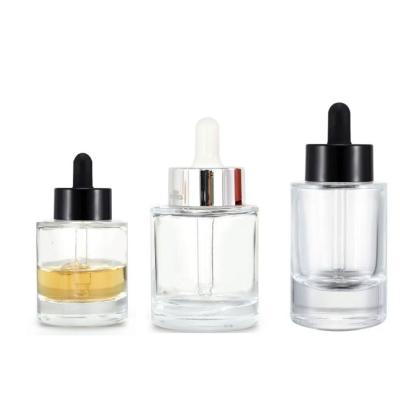 China 30ml 40ml 50ml Cosmetic Oil Flat Clear Glass Hair Serum Thick Bottom Dropper Bottle For Essential Oil With Gloss Wide White Dropper for sale