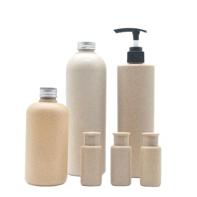 China Cosmetic In Stock 100ml 250ml 500ml Wheat Straw HDPE Lotion Bottle Biodegradable Shampoo Bottle With Black Pump for sale