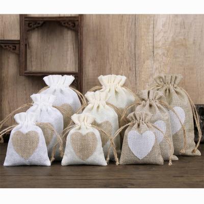 China Small Recyclable Jewelry Bags 10x14cm Jute Print Heart Pouches Wedding Christmas Gift Package Pouch for sale