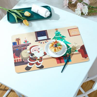 China Hot sale Christmas pattern hotel tableware non-slip mat printed custom environmental printing leather table mat for sale