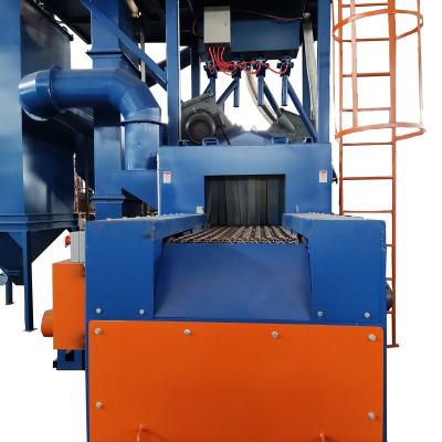 China Cleaning Aluminum Wheels Wire Mesh Belt Shot Blasting Machine For Outdoor Cleaning for sale